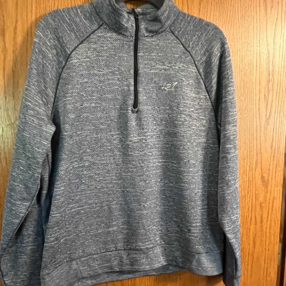 Greg Norman shark golf style 1/4 zip.‎ Great condition. Blue heather medium.